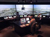 Photo of staff in FutureFlight tower cab with views of Los Angeles International Airpoort